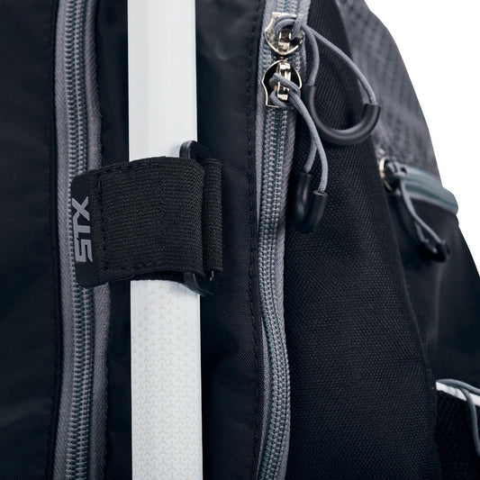 stx sidewinder lacrosse backpack close up of stick strap