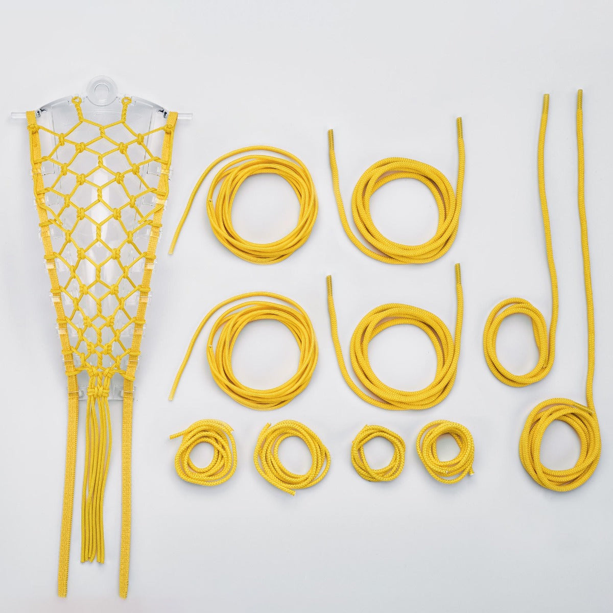 women's lock pocket stringing kit all strings laid out yellow