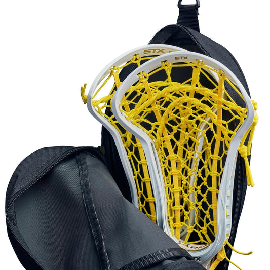 stx essential lacrosse stick bag close up of top of bag with two sticks in it